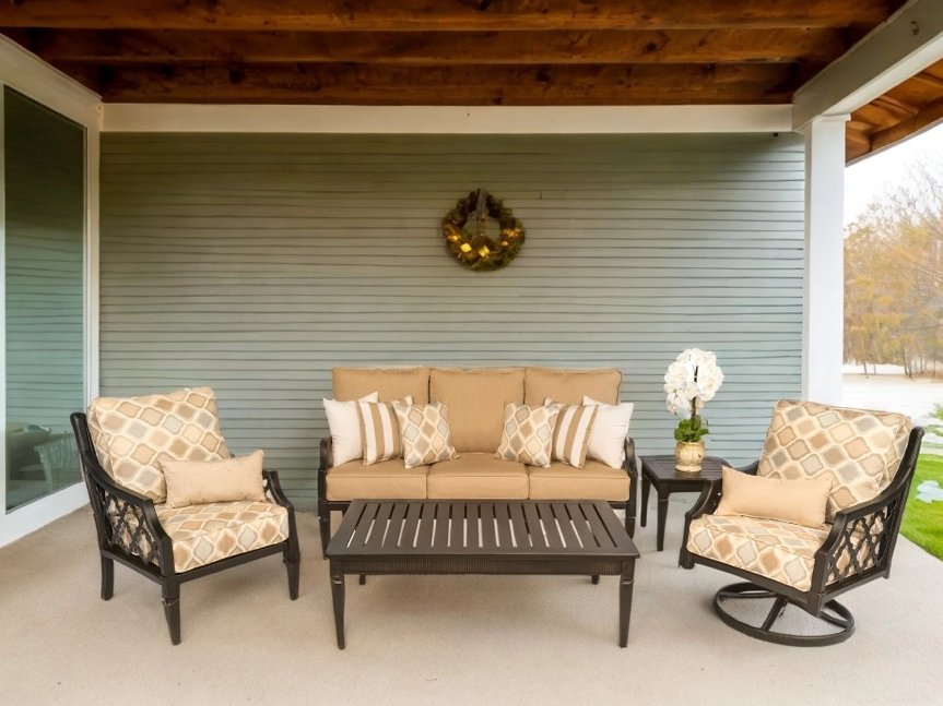 Mirabella outdoor sofa and lounge chairs on a covered patio