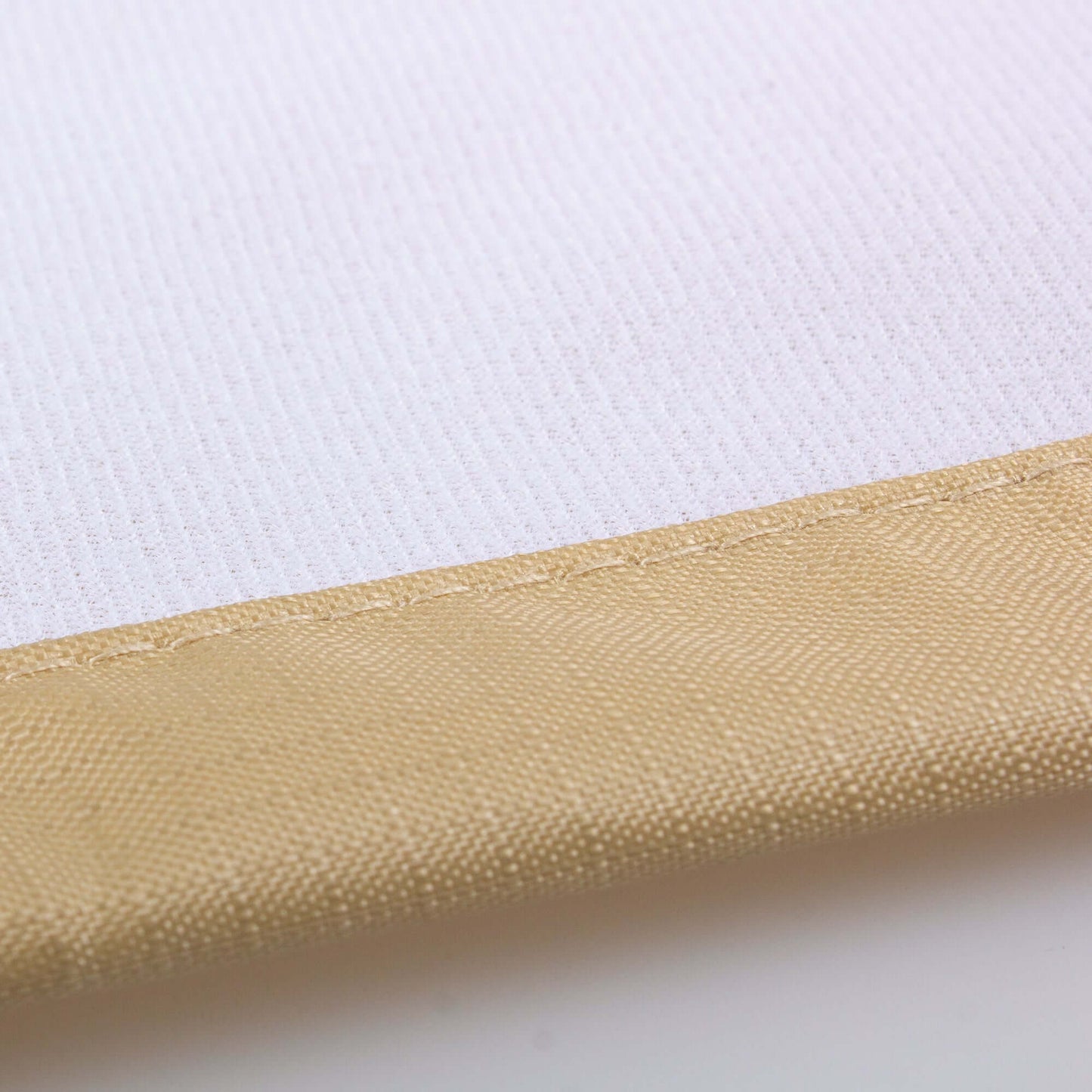 Close-up of weatherproof fabric edge showing heavy-duty stitching for Outdoor Chaise Lounge Cover – Weatherproof, UV-Resistant, All-Weather Protection (76”L x 28”W x 30”H).
