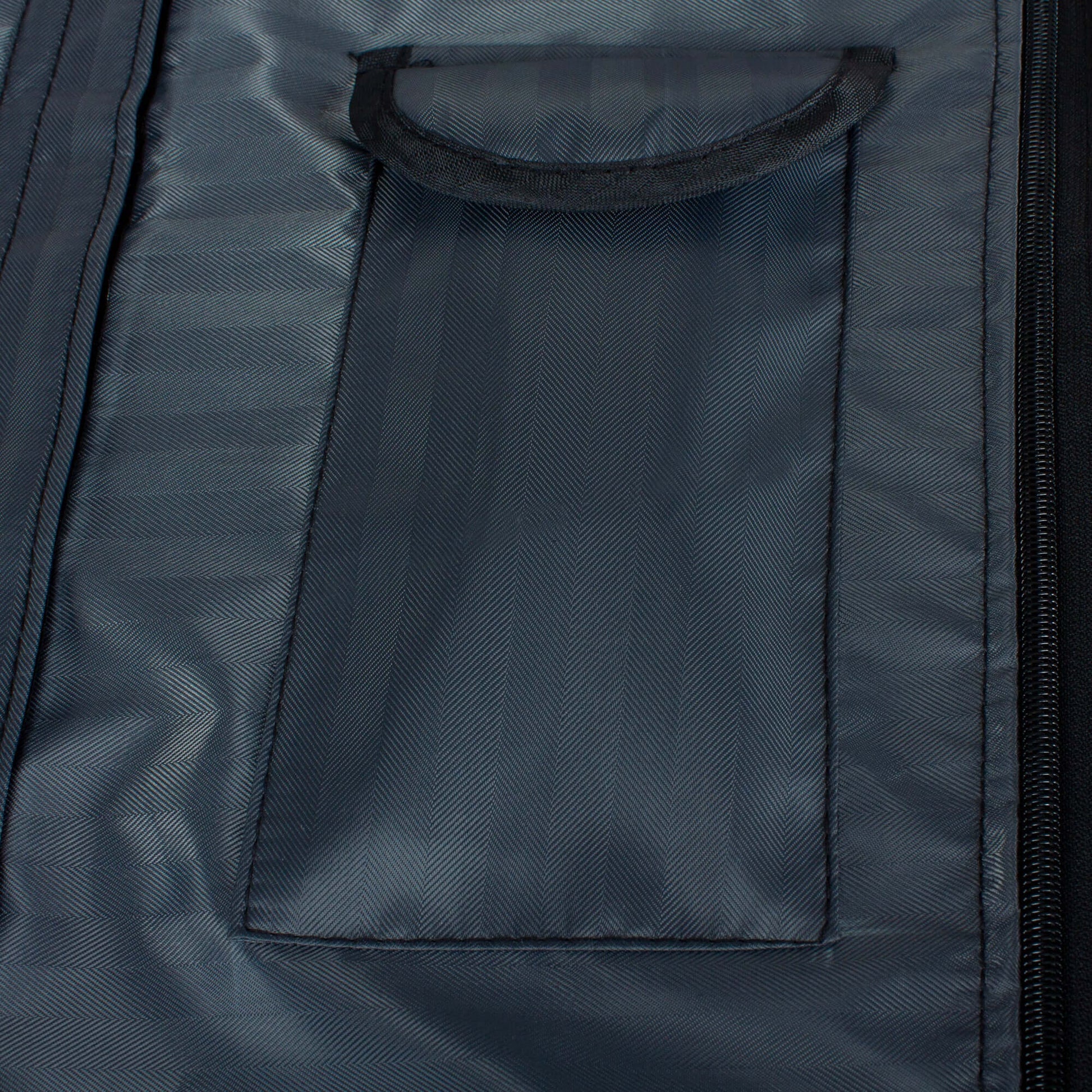 Durable Outdoor TV Cover for 50" TVs - Weatherproof, Dustproof & UV Resistant with Secure Fit shows inside fabric detail.