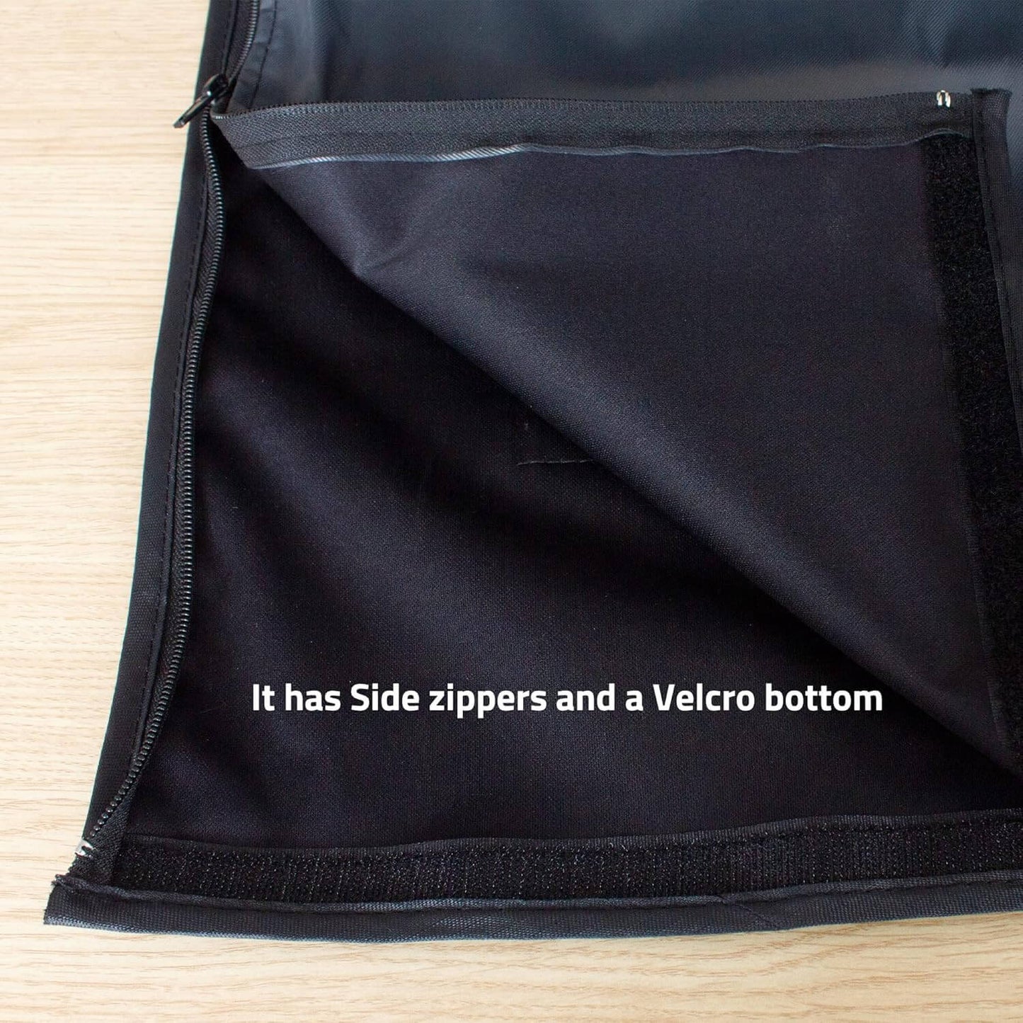 Durable Outdoor TV Cover for 50" TVs - Weatherproof, Dustproof & UV Resistant with Secure Fit showing side zippers and Velcro bottom.